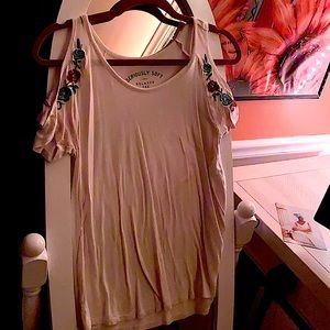 White tank top with floral accents